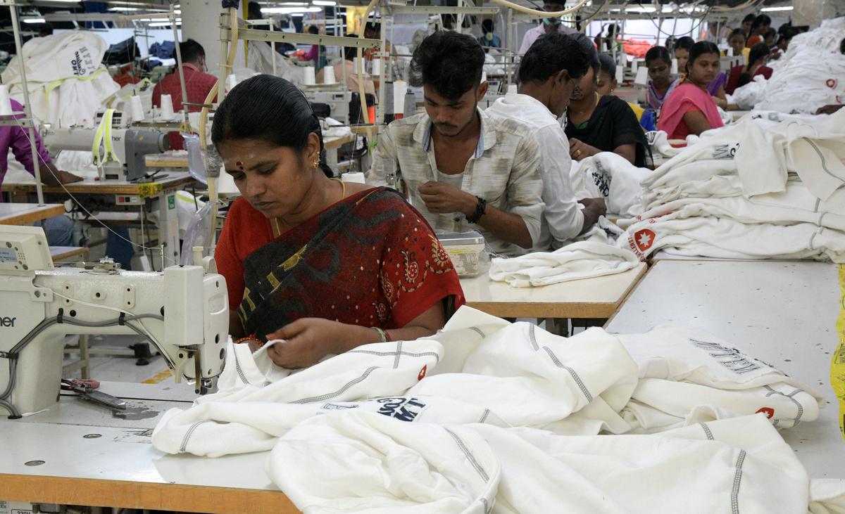 Workers stitching garments at a knitwear export unit in Tirupur.
Photo:S. Siva Saravanan/ The Hindu Workers stitching garments at a knitwear export unit in Tirupur.
Photo:S. Siva Saravanan/ The Hindu