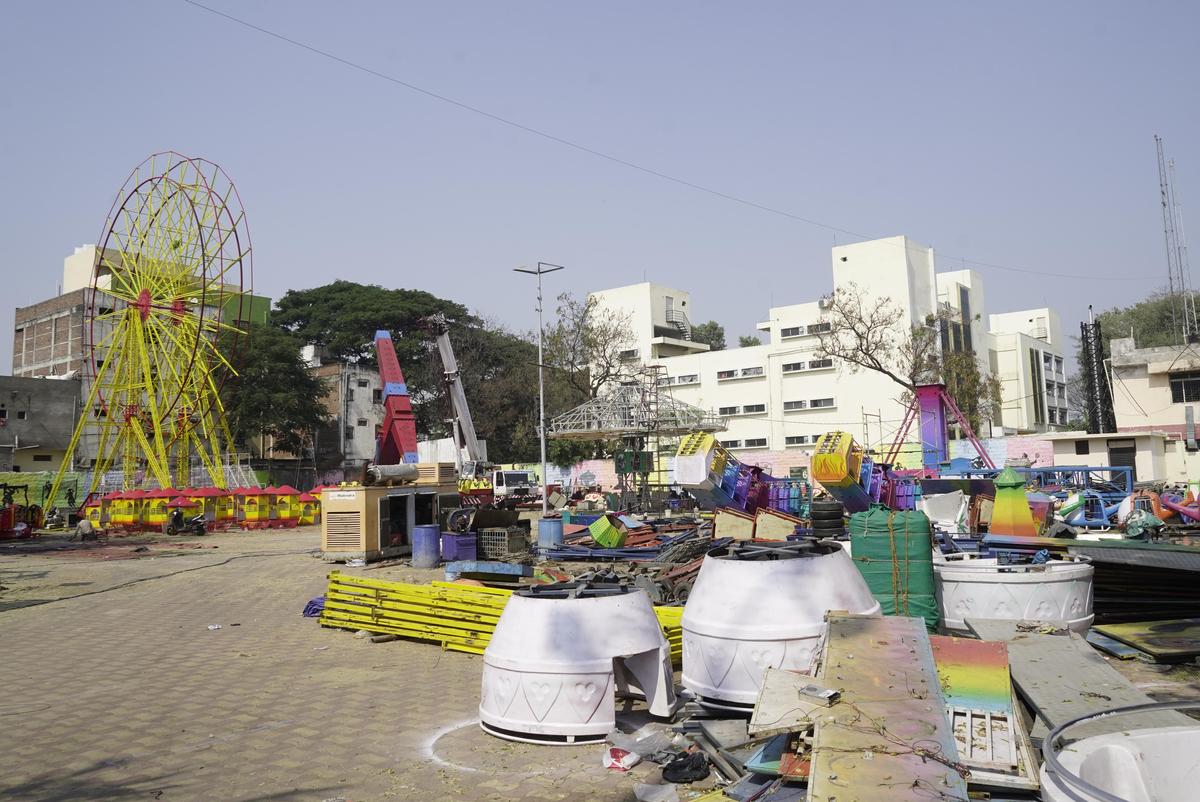 Preparations underway at the Nampally Exhibition Grounds ahead of the upcoming Numaish 2026, with workers setting up temporary structures and infrastructure in Hyderabad on Wednesday. 