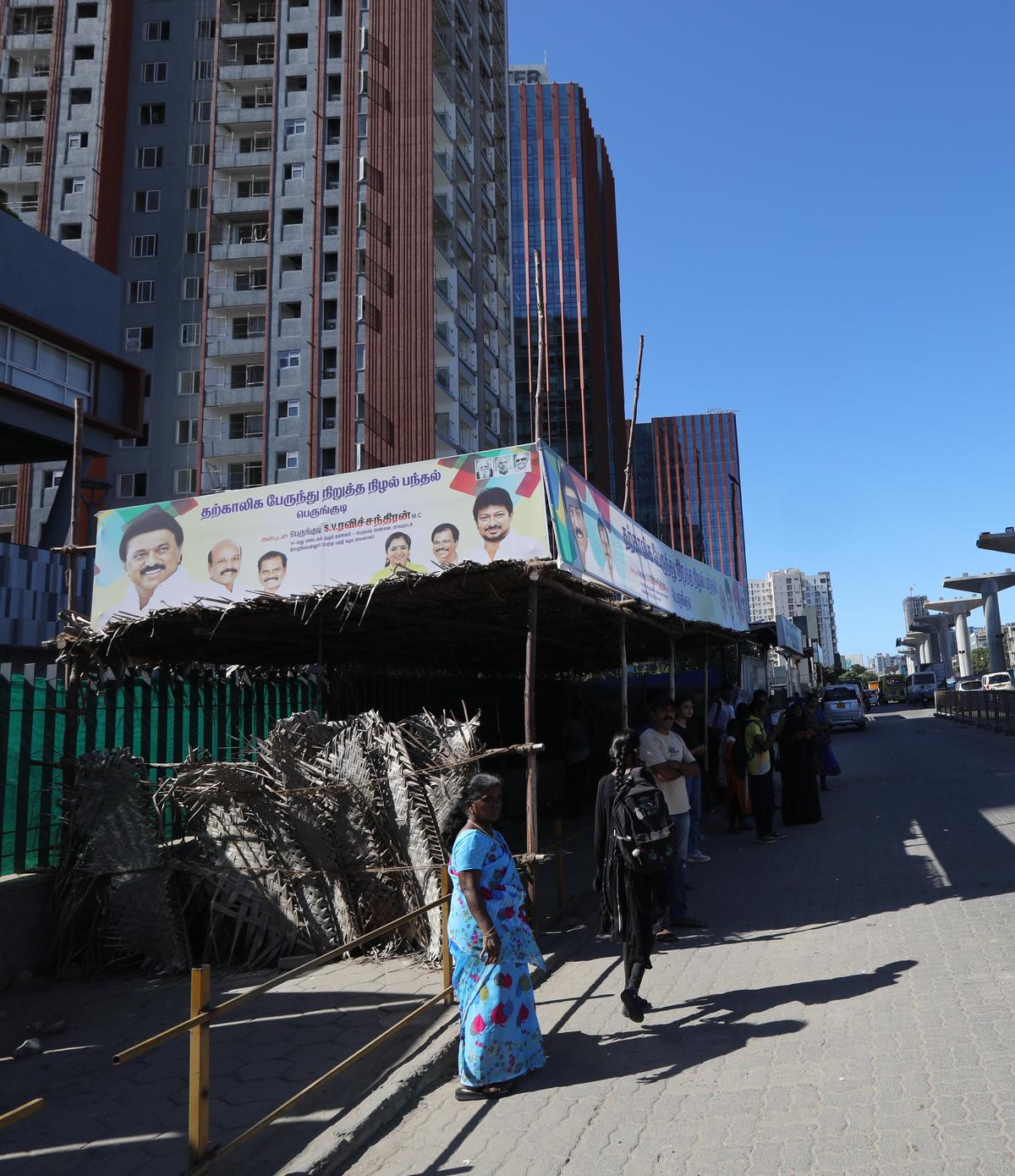 The temporary bus shelter and regular shelters at Perungudi bus stop. 