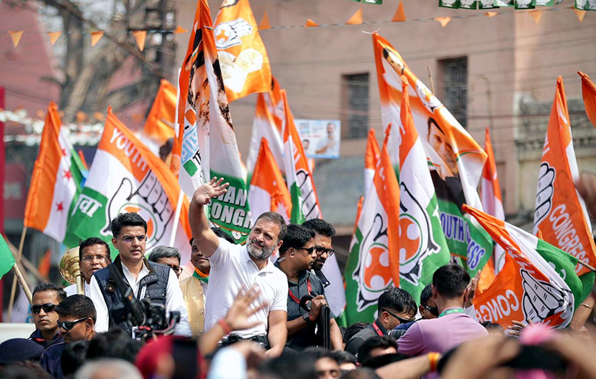 Congress leader Rahul Gandhi waves to supporter during the Bharat Jodo Nyay Yatra from Raigarh on February 11, 2024. Photo: AICC via ANI