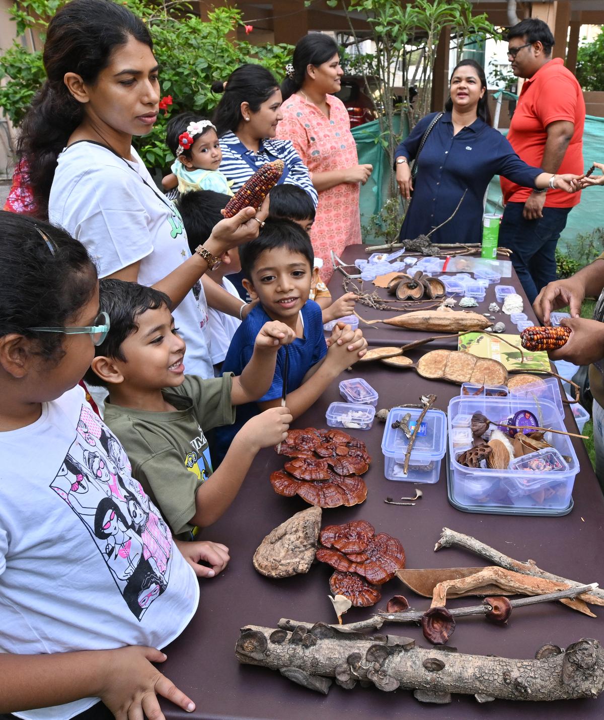 Participants experiencing the portable natural history museum by Wilded, a Nature education group, at a residential society in Visakhapatnam. Hindu Participants experiencing the portable natural history museum by Wilded, a Nature education group, at a residential society in Visakhapatnam. Hindu
