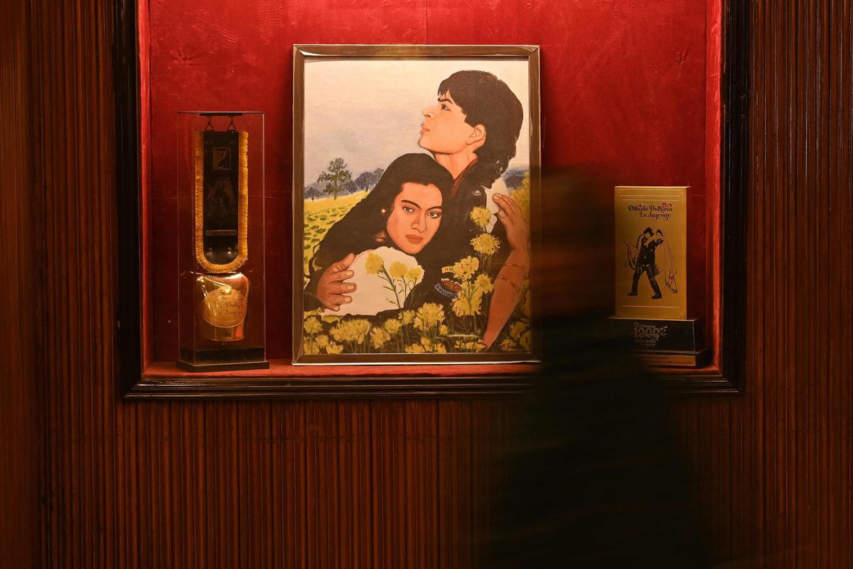 A painting of Indian actors Shah Rukh Khan and Kajol Mumbai's Maratha Mandir theatre since its debut A painting of Indian actors Shah Rukh Khan and Kajol Mumbai's Maratha Mandir theatre since its debut