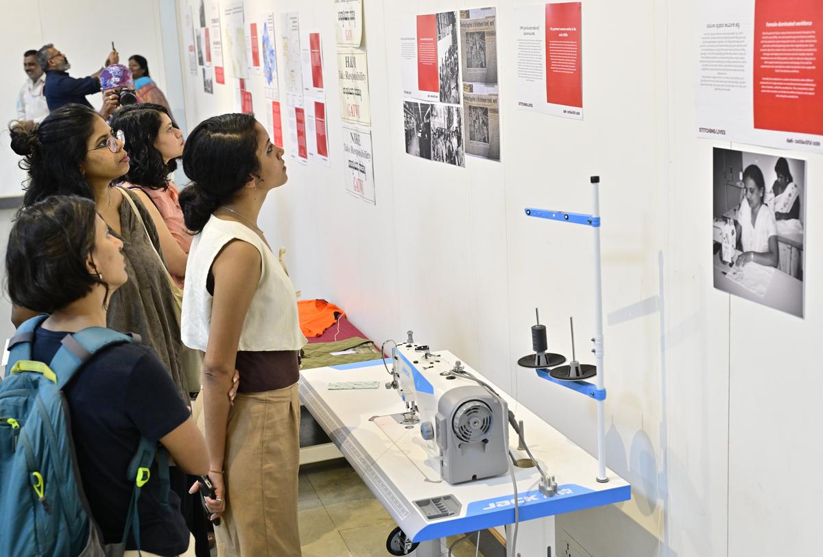 Visitors at ‘Stitching Lives: Garment work and Activism’, an exhibition at Karnataka Chitrakala Parishat in Bengaluru on Saturday.