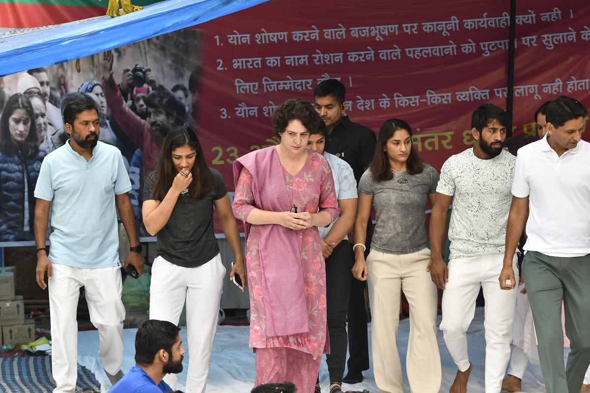 Congress leaders Priyanka Gandhi Vadra and Deepender Singh Hooda with wrestlers Bajrang Punia, Vinesh Phogat, Sangeeta Phogat and Sakshi Malik at Jantar Mantar in New Delhi on Saturday, April 29, 2023. 