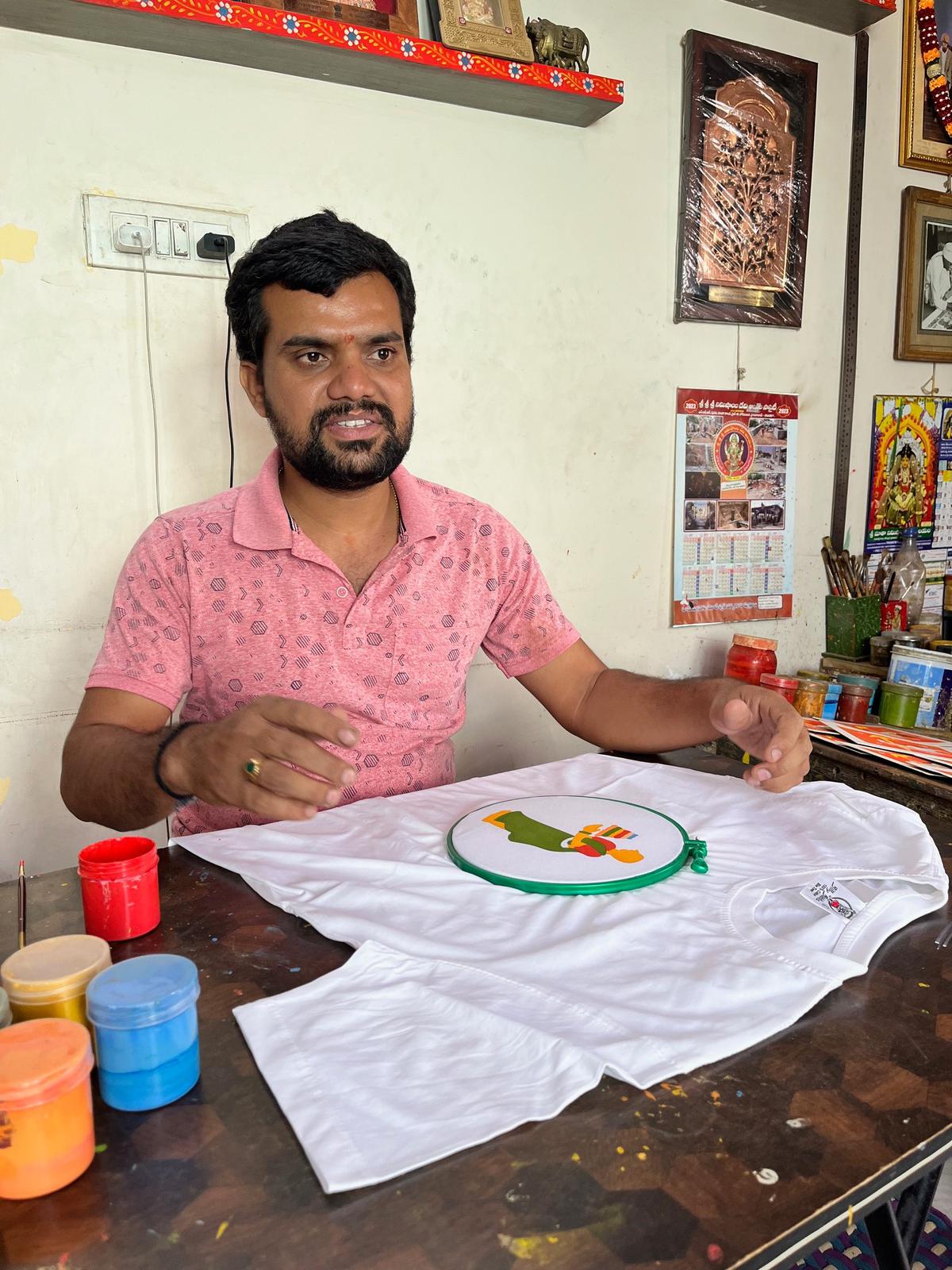 Rakesh painting on a tshirt