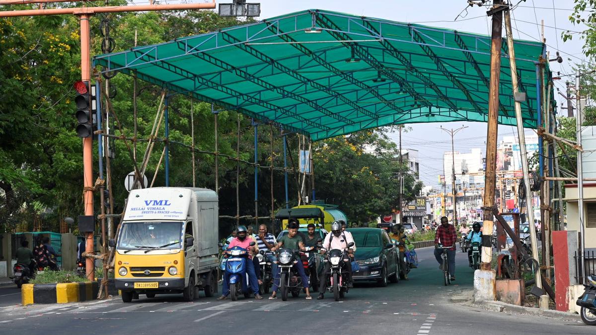 Green shade nets installed at traffic junctions in Erode provide temporary relief to motorists