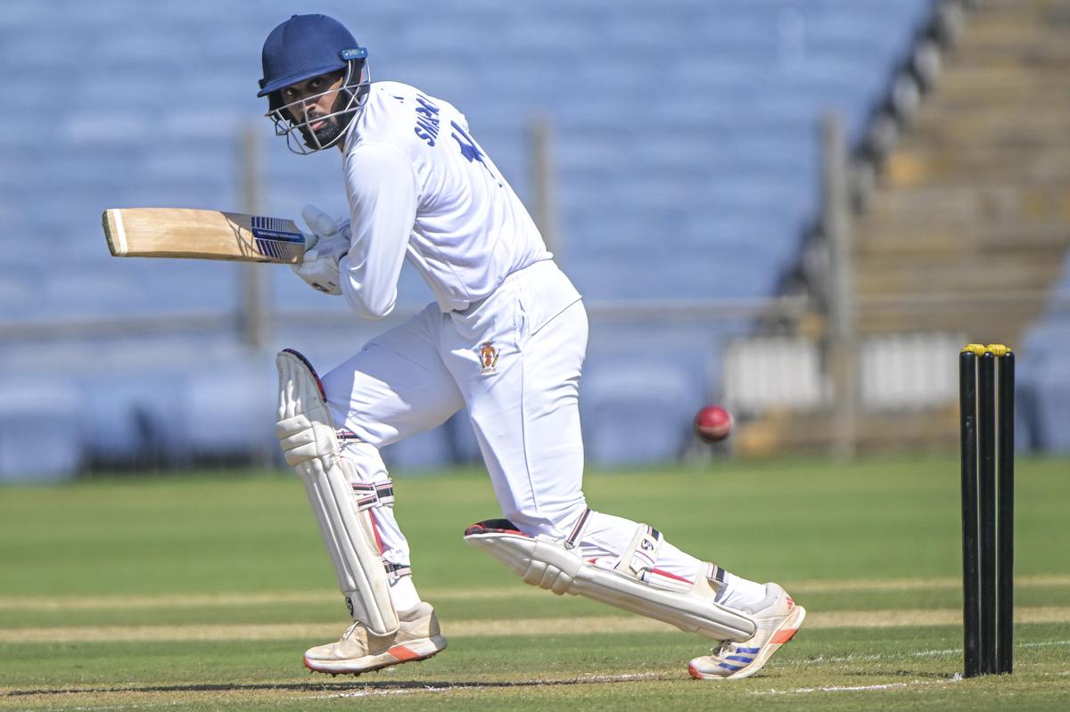 Karnataka’s Smaran R plays a shot on the first day of the Ranji Trophy match against Maharashtra at the MCA Stadium in Pune on Saturday, November 8, 2025.