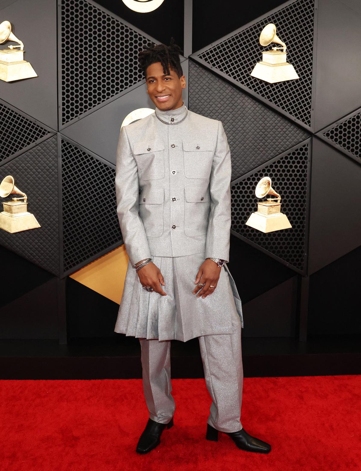 Jon Batiste  poses on the red carpet as he attends the 66th Annual Grammy Awards in Los Angeles, California, U.S., February 4, 2024.