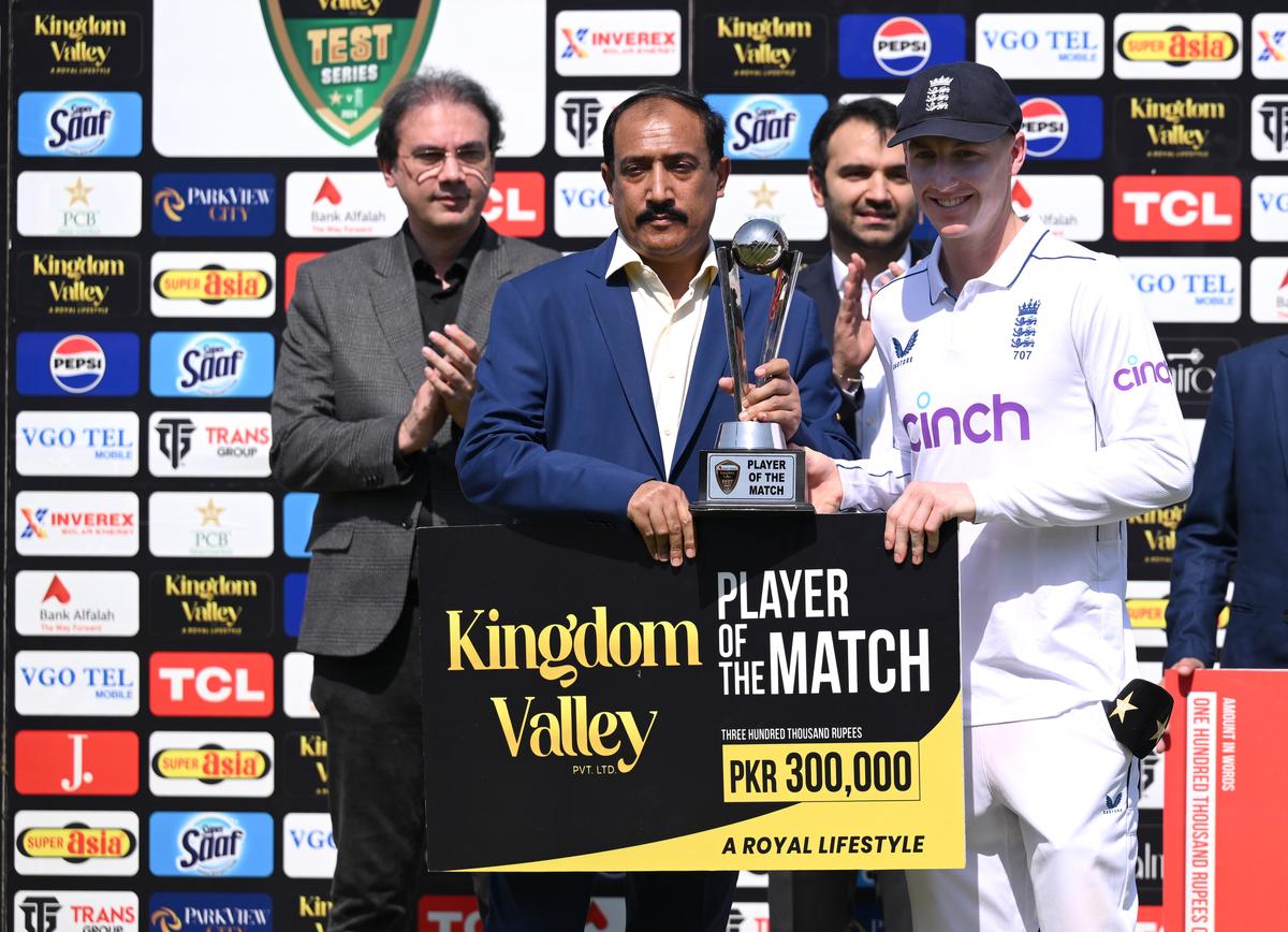 England’s Harry Brook pictured with his player of the match award after day five of the first Test Match against Pakistan in Multan on October 11, 2024.