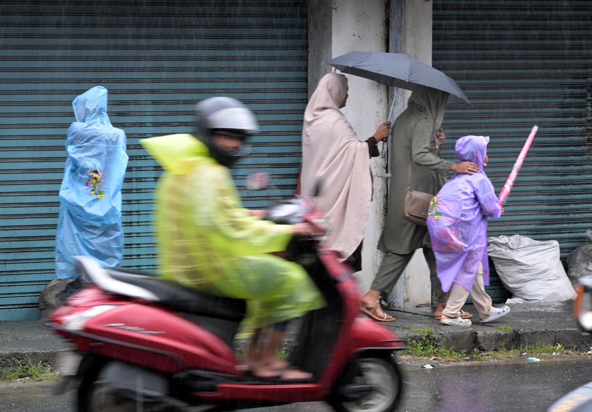 Palakkad witnessed intermittent heavy showers on Monday. A scene from T.B. Road in Palakkad town. 
