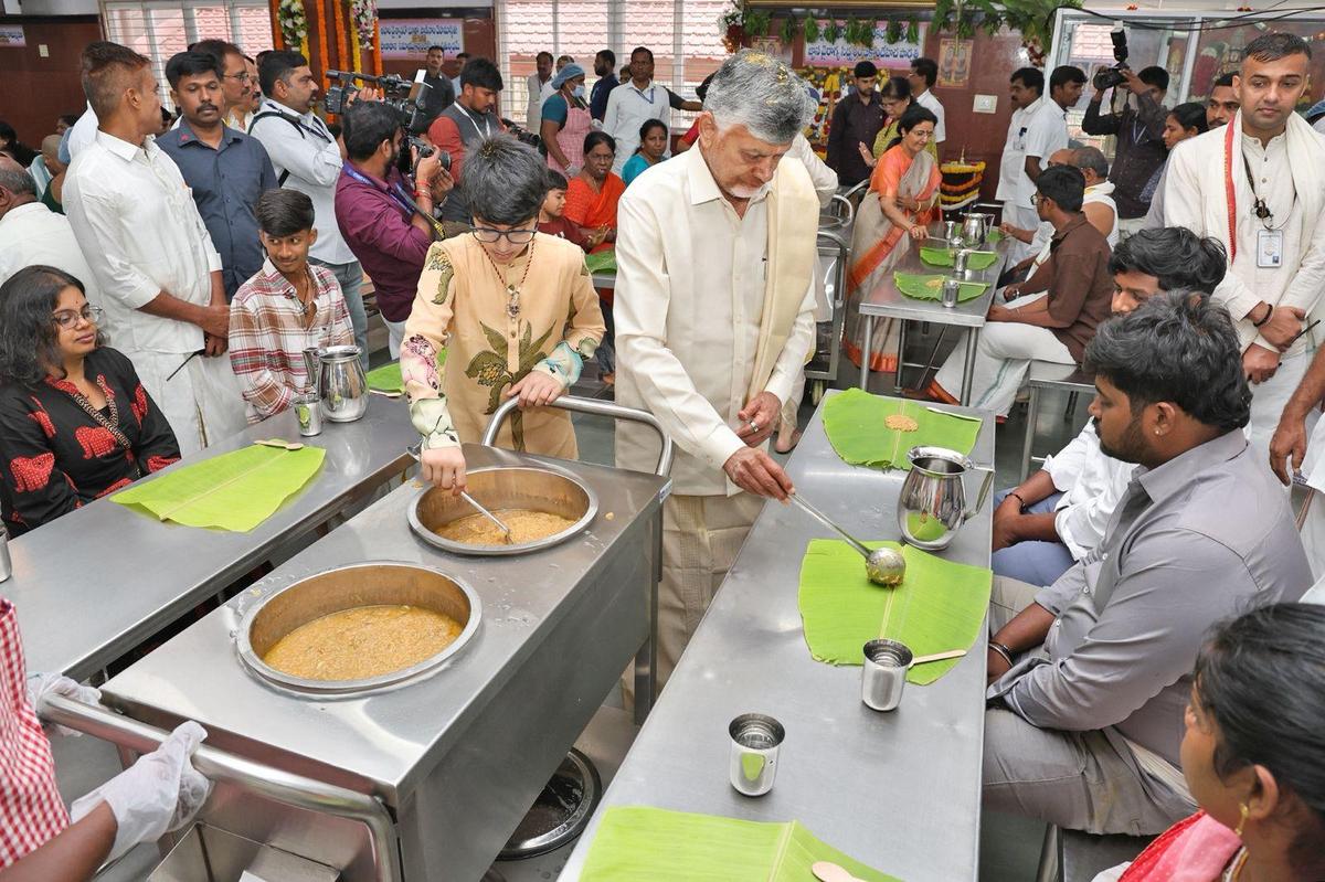 Chief Minister N. Chandrababu Naidu along with his grandson Nara Devansh serving breakfast to devotees at Matrusri Tarigonda Vengamamba Anna Prasadam Complex on Tirumala on Saturday. Chief Minister N. Chandrababu Naidu along with his grandson Nara Devansh serving breakfast to devotees at Matrusri Tarigonda Vengamamba Anna Prasadam Complex on Tirumala on Saturday.