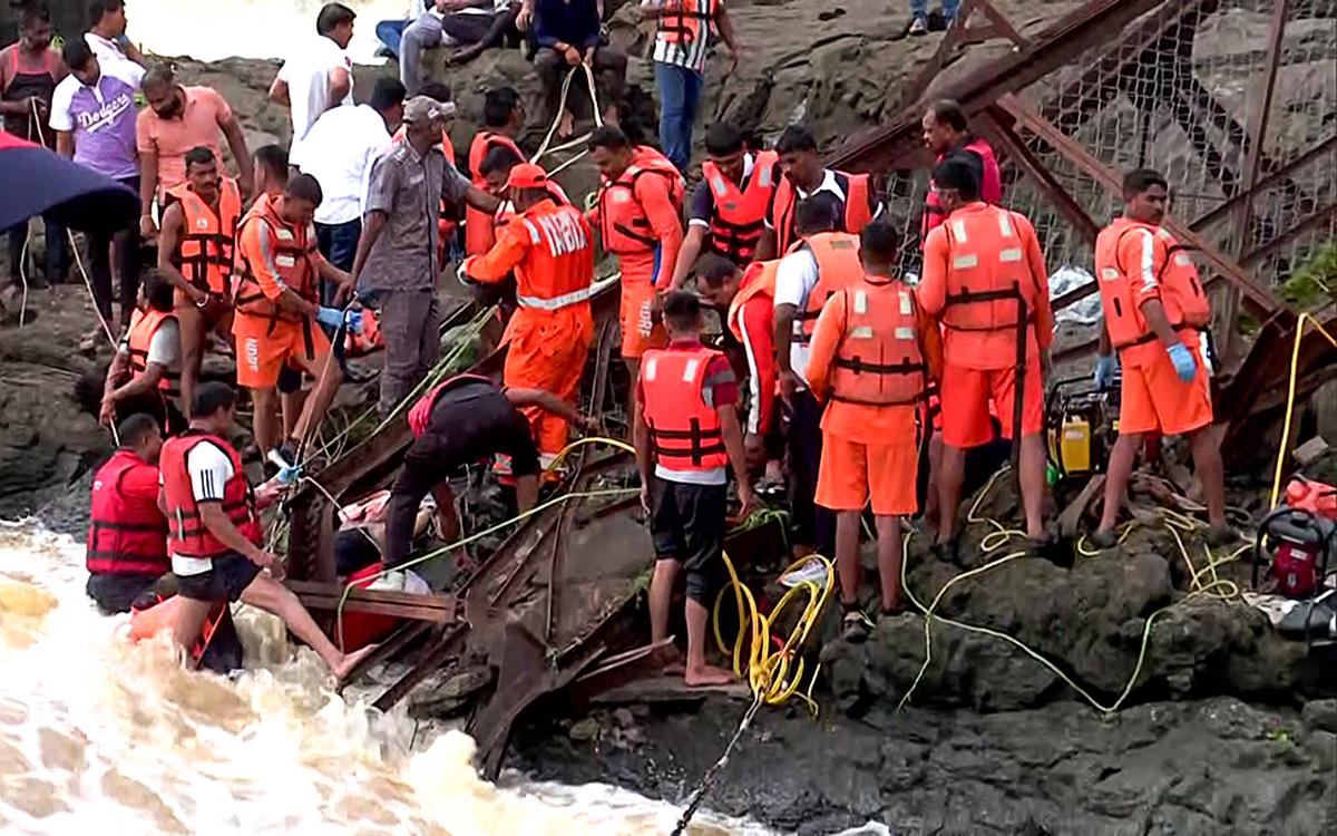 National Disaster Response Force (NDRF) Personnel Conduct a Rescue Operation at the Bridge Collapse Site, In Pune. The bridge was declared unfit for vegetable traffic, while a new structure has been proposed for vehicles, pune collector jitendra dudi said. National Disaster Response Force (NDRF) Personnel Conduct a Rescue Operation at the Bridge Collapse Site, In Pune. The bridge was declared unfit for vegetable traffic, while a new structure has been proposed for vehicles, pune collector jitendra dudi said.