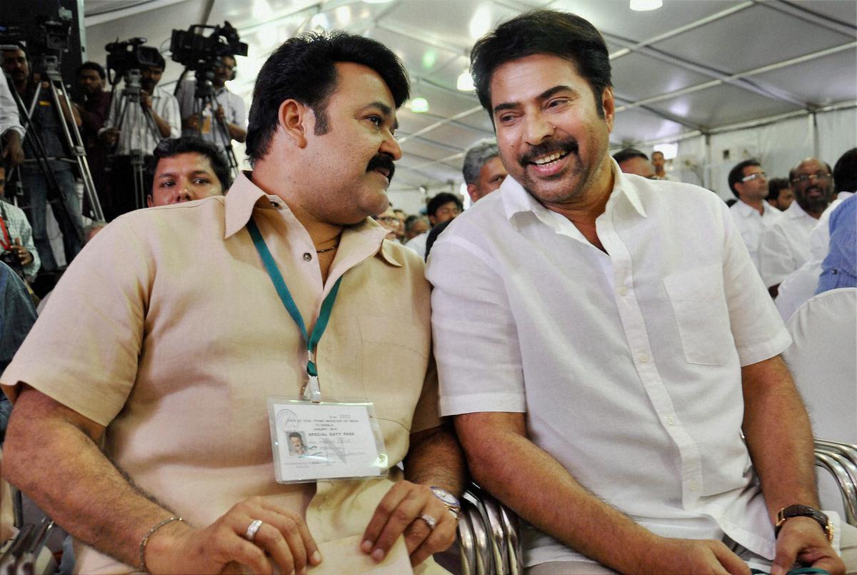 Malayalam actors Mohanlal (left) and Mammootty at an event in Kochi, 2014. 