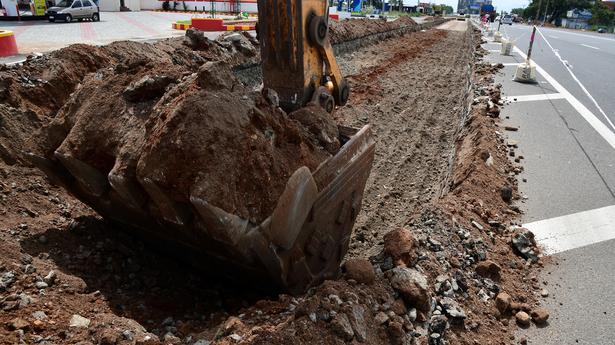 Coimbatore: Overloaded truck causes road to cave in at flower market