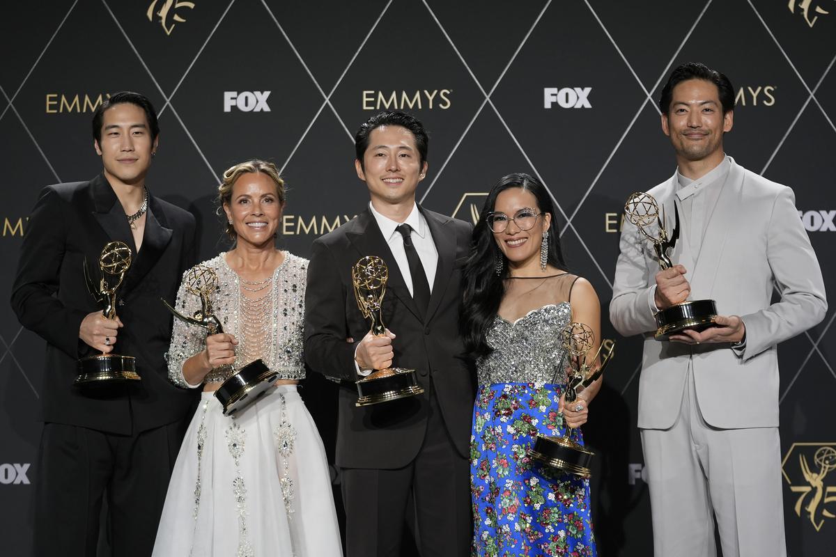 Young Mazino, from left, Maria Bello, Steven Yeun, Ali Wong, and Joseph Lee, winners of the award for outstanding limited or anthology series for 'Beef,' pose in the press room during the 75th Primetime Emmy Awards on Monday, Jan. 15, 2024, at the Peacock Theater in Los Angeles. (AP Photo/Ashley Landis)