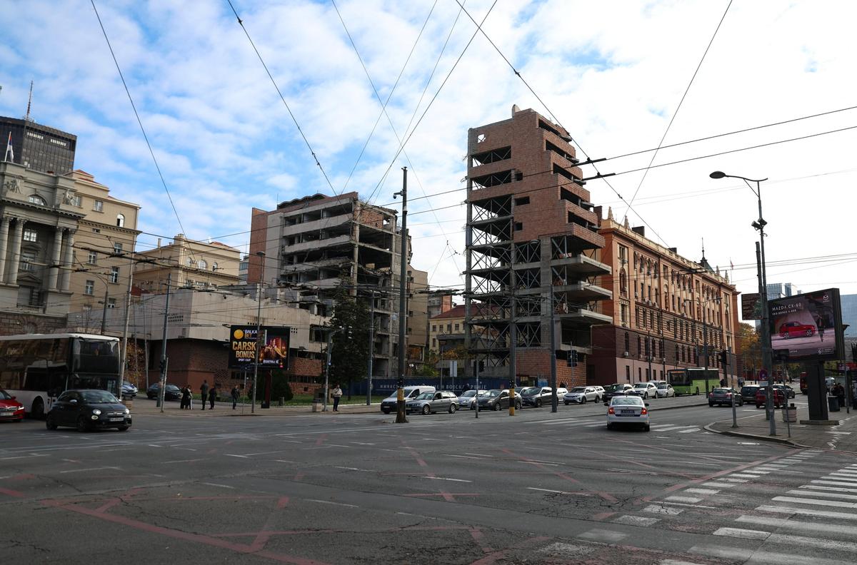 Traffic moves on a road near the old army headquarters buildings, as Serbia passes special bill enabling Trump’s son-in-law to build luxury complex despite opposition from people