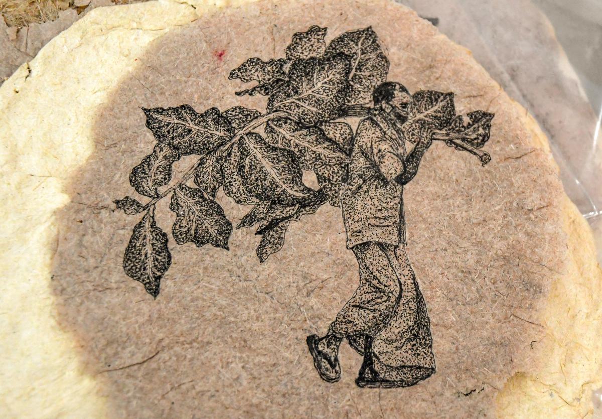 Students of department of Fine Arts, Andhra University, demonstrating their work dueing the paper making and relief print workshop in Visakhapatnam