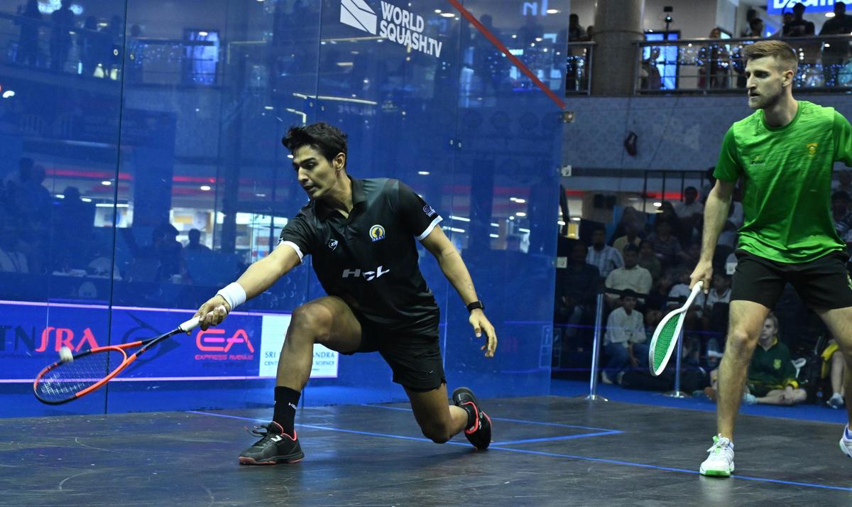Abhay Singh of India and Dewald Van Niekerk  of South Africa in action at the SDAT World Cup squash tournament in Chennai on Friday, December 12, 2025.
