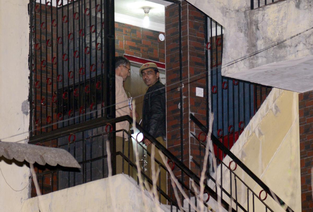 Police personnel at the residence of Geetika Sharma at Ashok Vihar in New Delhi.