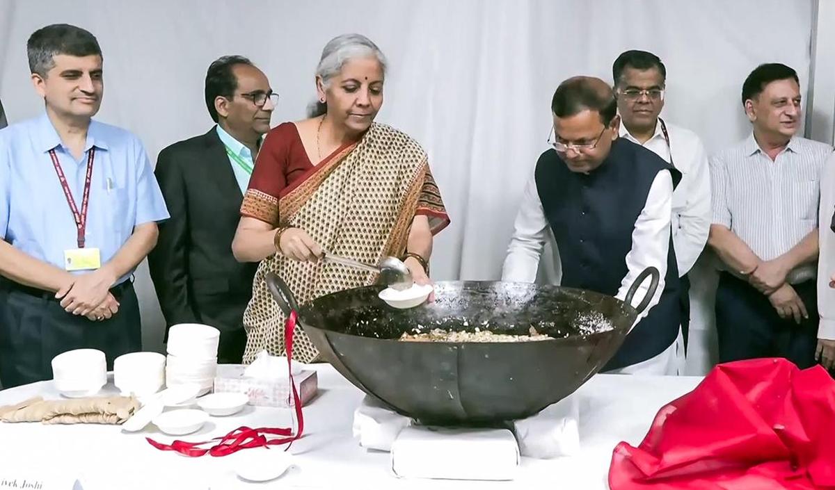 Union Finance Minister Nirmala Sitharaman distributes halwa during the Halwa ceremony as the final stage of Budget preparations for the 'Lock in' process commences, at North Block in New Delhi on January 27, 2026. Union Finance Minister Nirmala Sitharaman distributes halwa during the Halwa ceremony as the final stage of Budget preparations for the 'Lock in' process commences, at North Block in New Delhi on January 27, 2026.