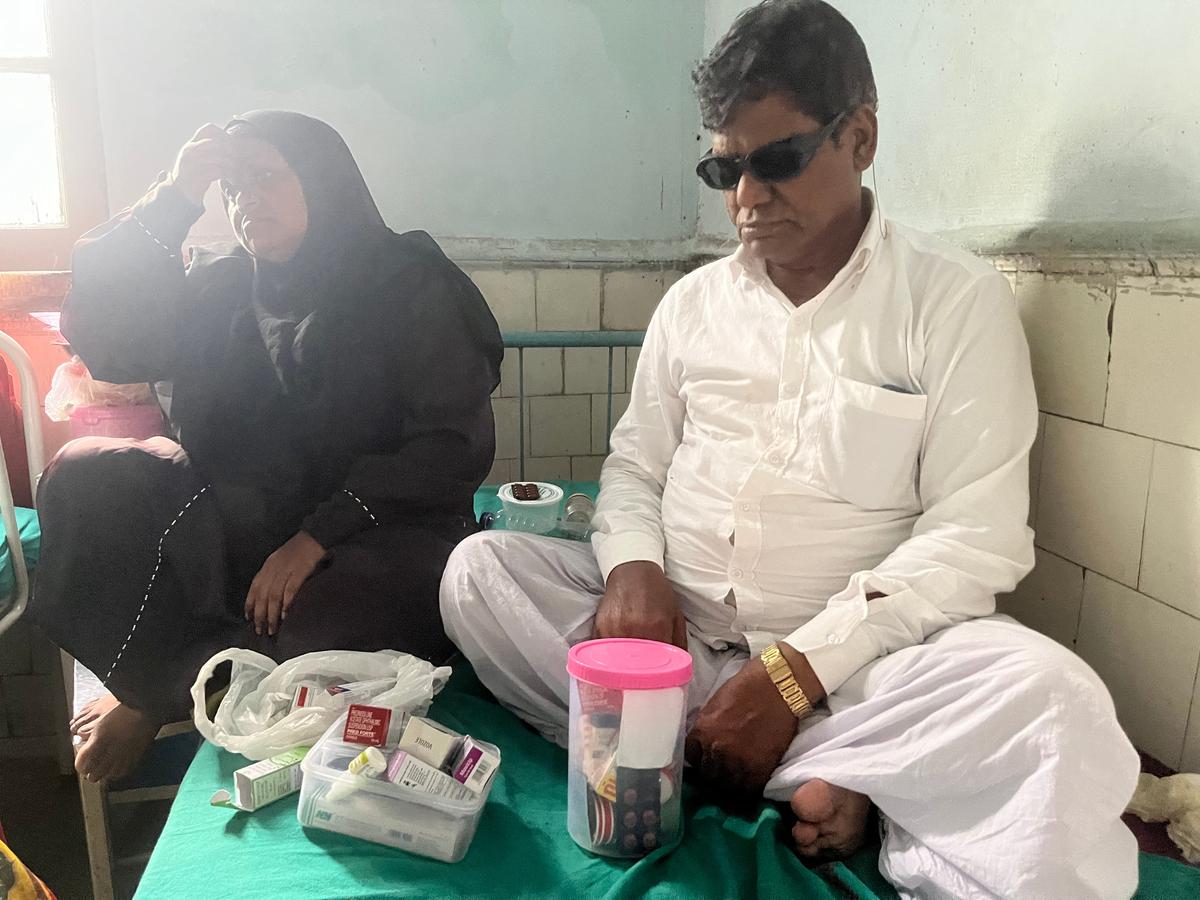 Salim Sheikh and his daughter Suraiya Bibi at the male eye ward in the Regional Institute of Ophthalmology at Medical College, Kolkata. 