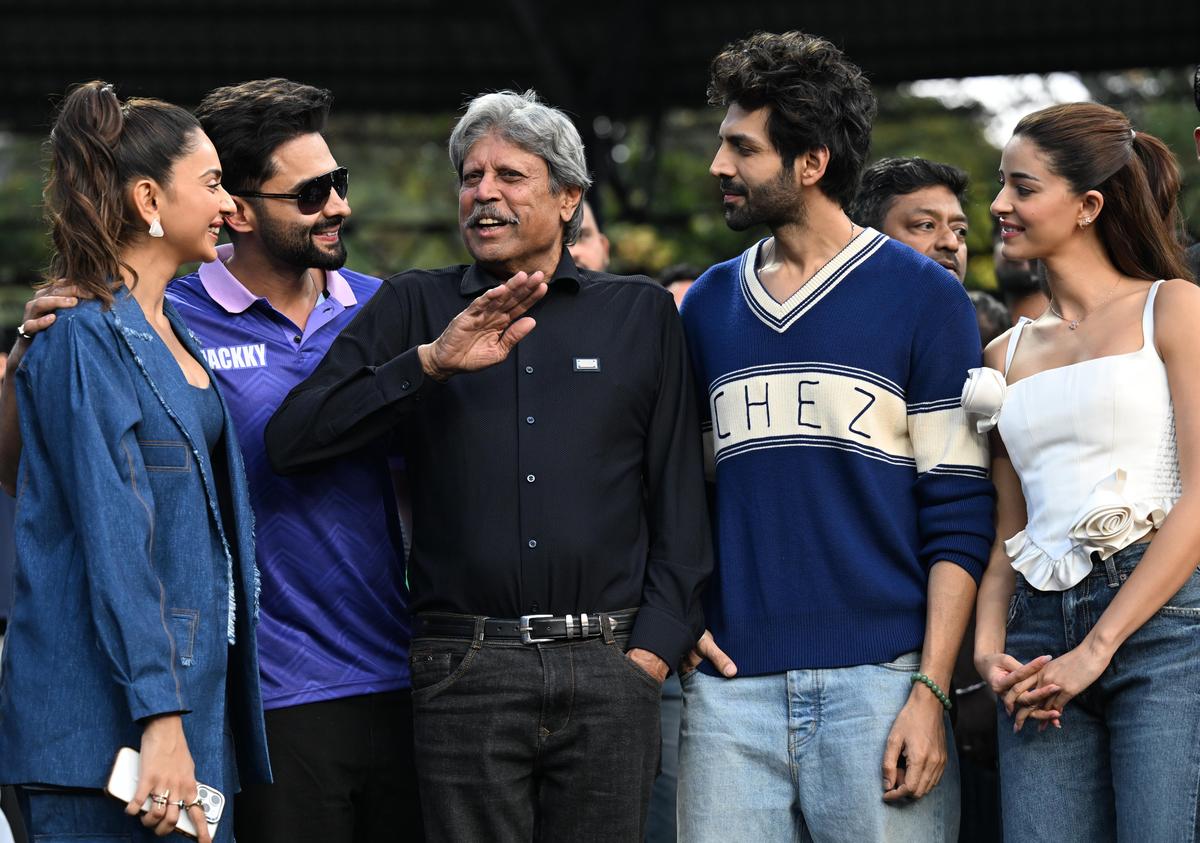 Legendary cricketer Kapil Dev with celebrities on the sidelines of the World Tennis League.