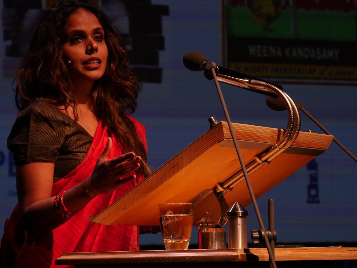 Meena Kandasamy in a handwoven red silk sari when she accepted the Fellowship of the Royal Society of Literature in London earlier this year.