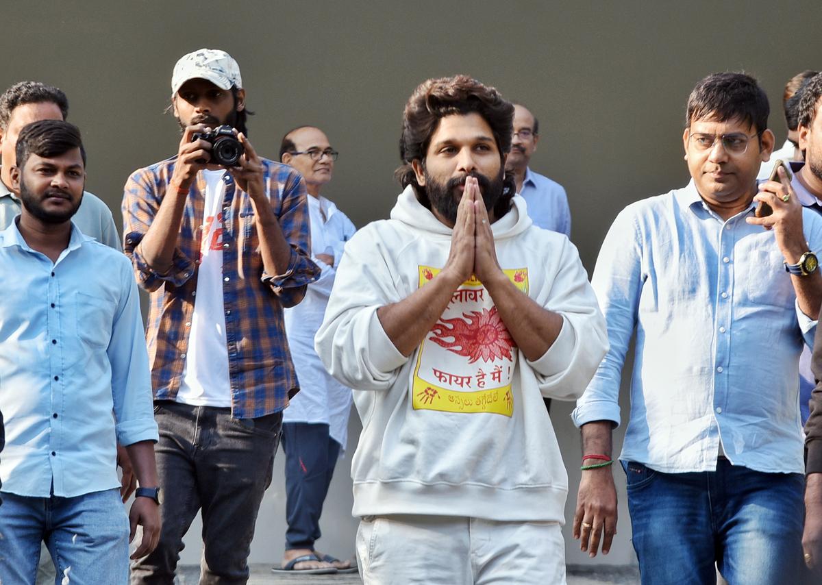 Actor Allu Arjun greets the media at his residence after being released from Chanchalguda Central Jail, in Hyderabad on December 14.