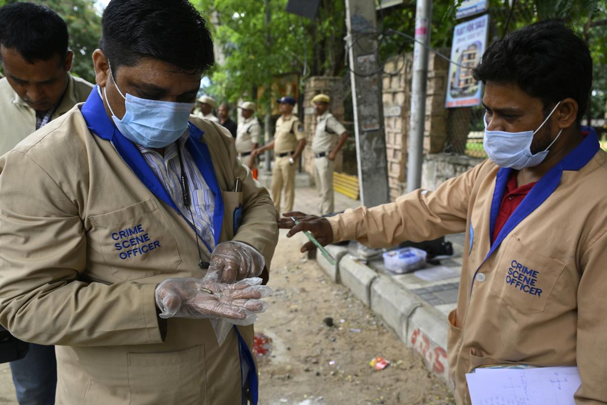 Police officers at the crime scene. Police officers at the crime scene.