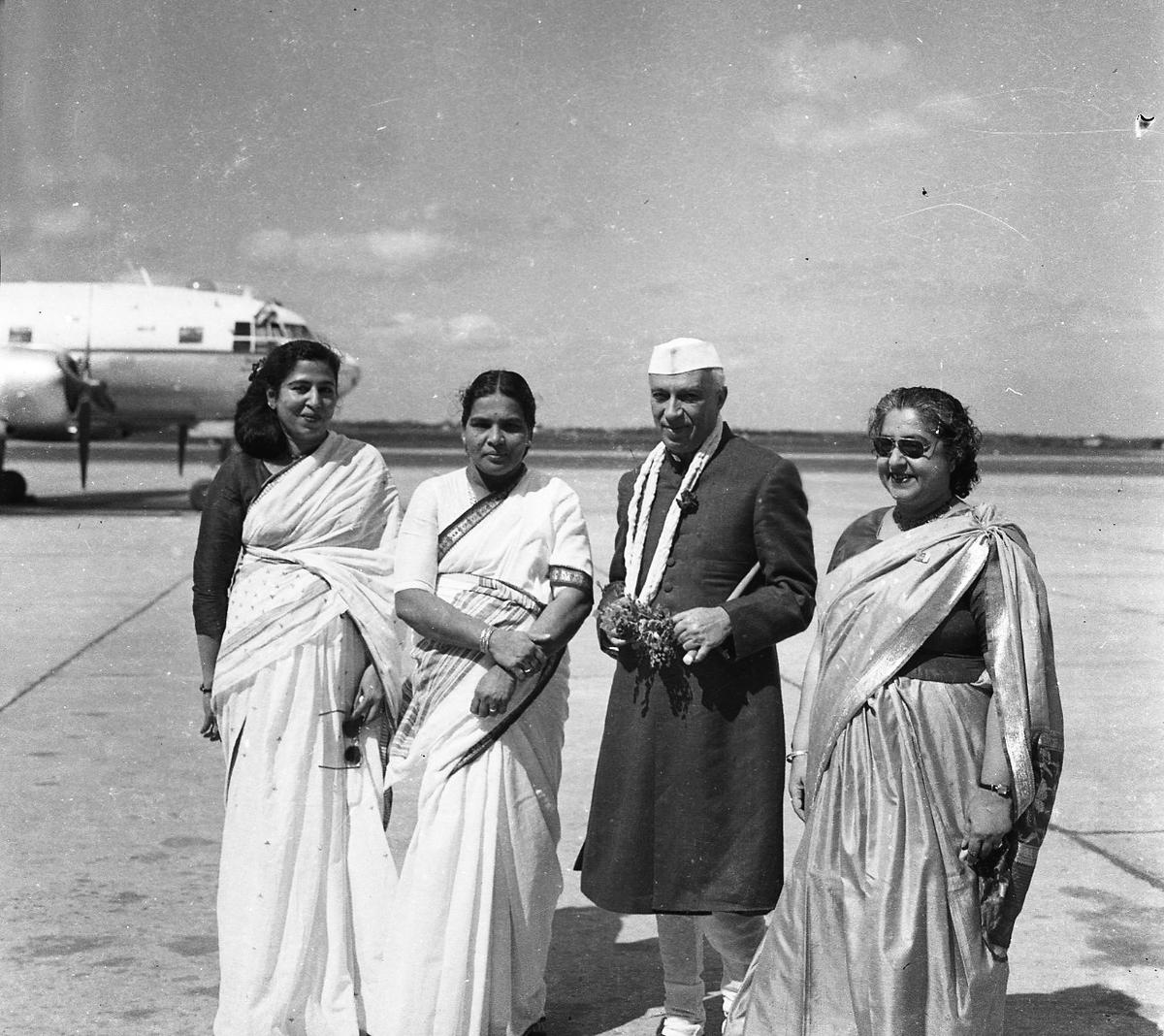 India's first Prime Minister, Jawaharlal Nehru, who arrived in Madras on December 7, 1957, is seen with (from left) the Mayor, Tara Cherian, Lourdhammal Simon, Minister, and the Sheriff Mary Clubwala Jadhav, at the airport.