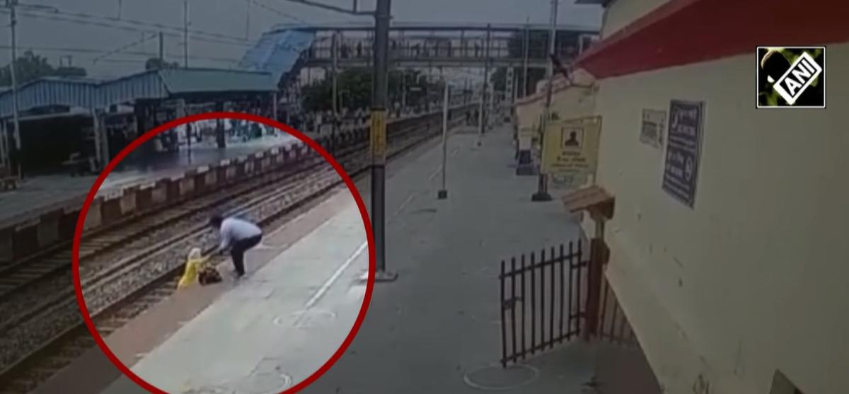 Watch | Alert cop saves woman from being crushed by speeding train in ...