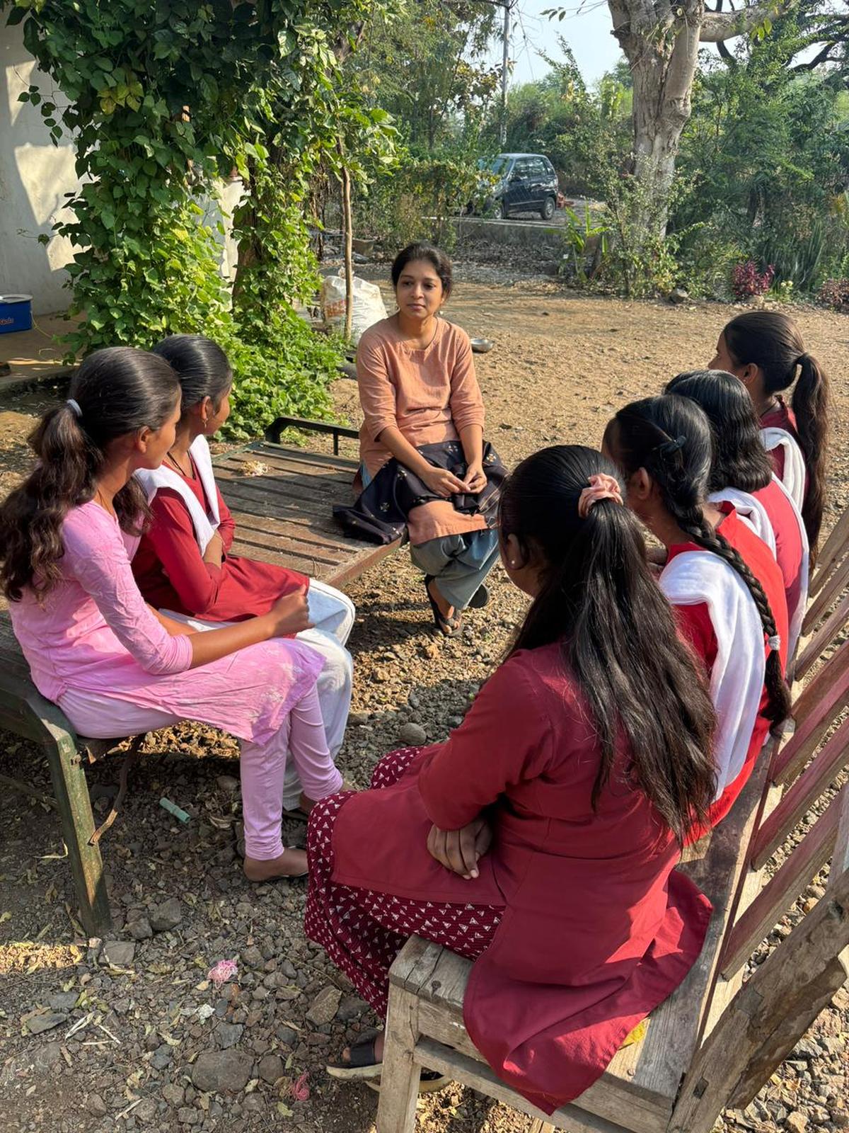 Shweta Bhattad tells the government school students of the village about alternative ways of farming, living and earning livelihood from it. The girls come from farming families or have farm labor backgrounds.