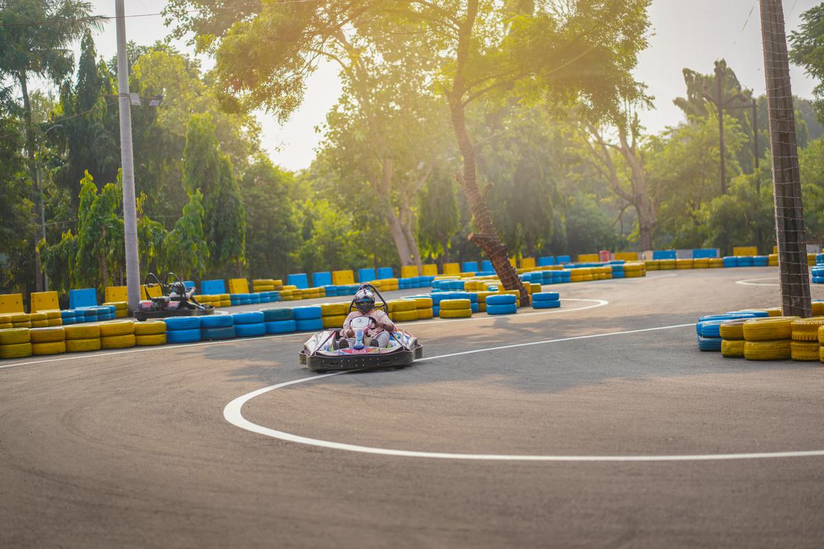 Enthusiasts racing at the new Go Karting racetrack at Vishwanadh Sports Academy, Port Stadium, in Visakhapatnam.