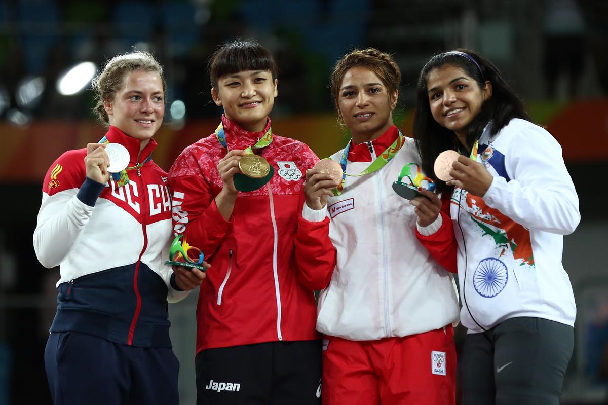 Sakshi Malik (right end) with other medal winners at the Rio 2016 Olympic Games, in Brazil. 