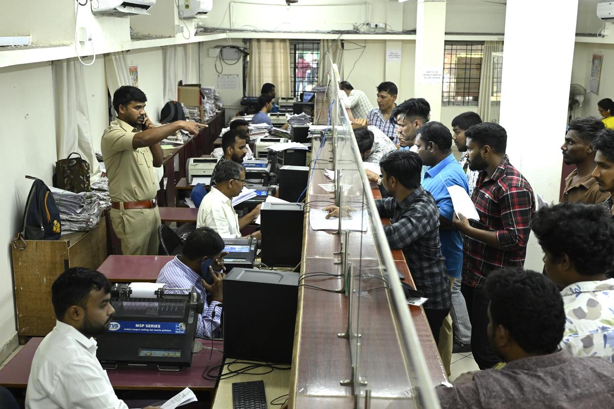 People waiting in front of the counters at the RTO office in Hyderabad. People waiting in front of the counters at the RTO office in Hyderabad.