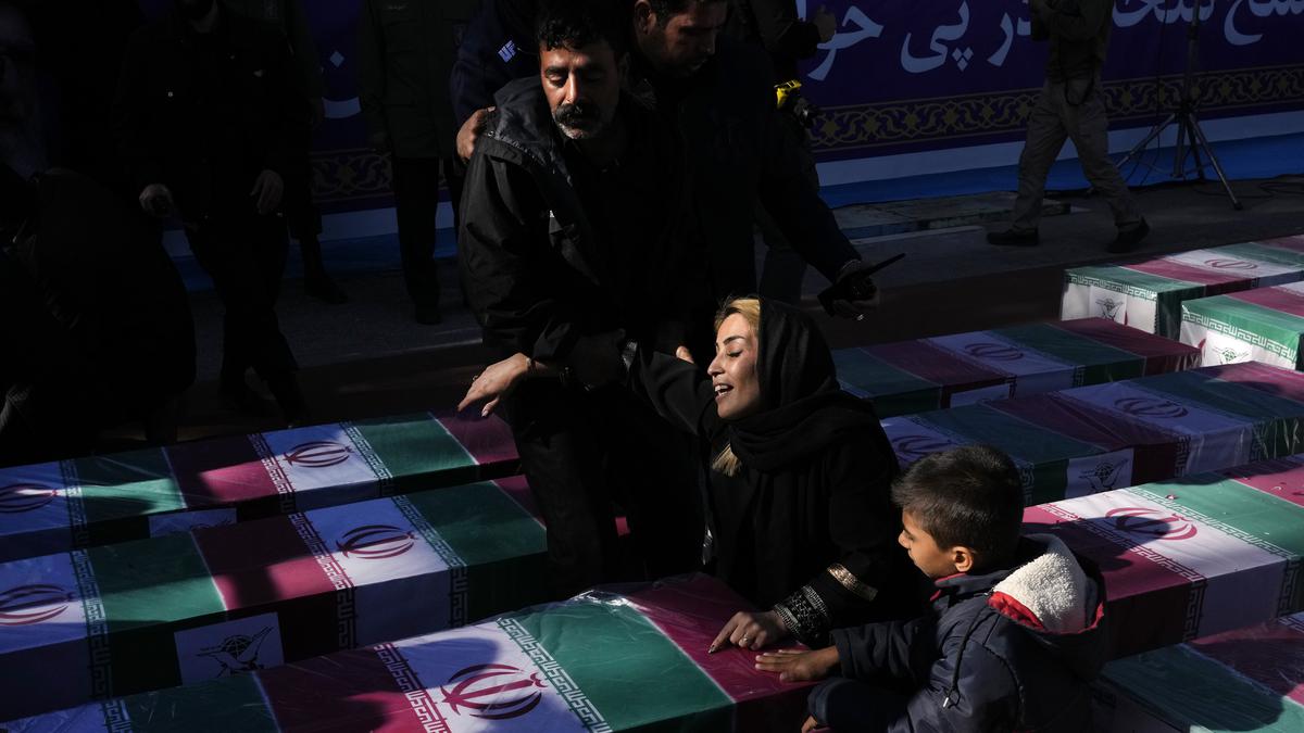 Iran mourns those killed in Islamic State-claimed suicide blasts as death toll rises to 89