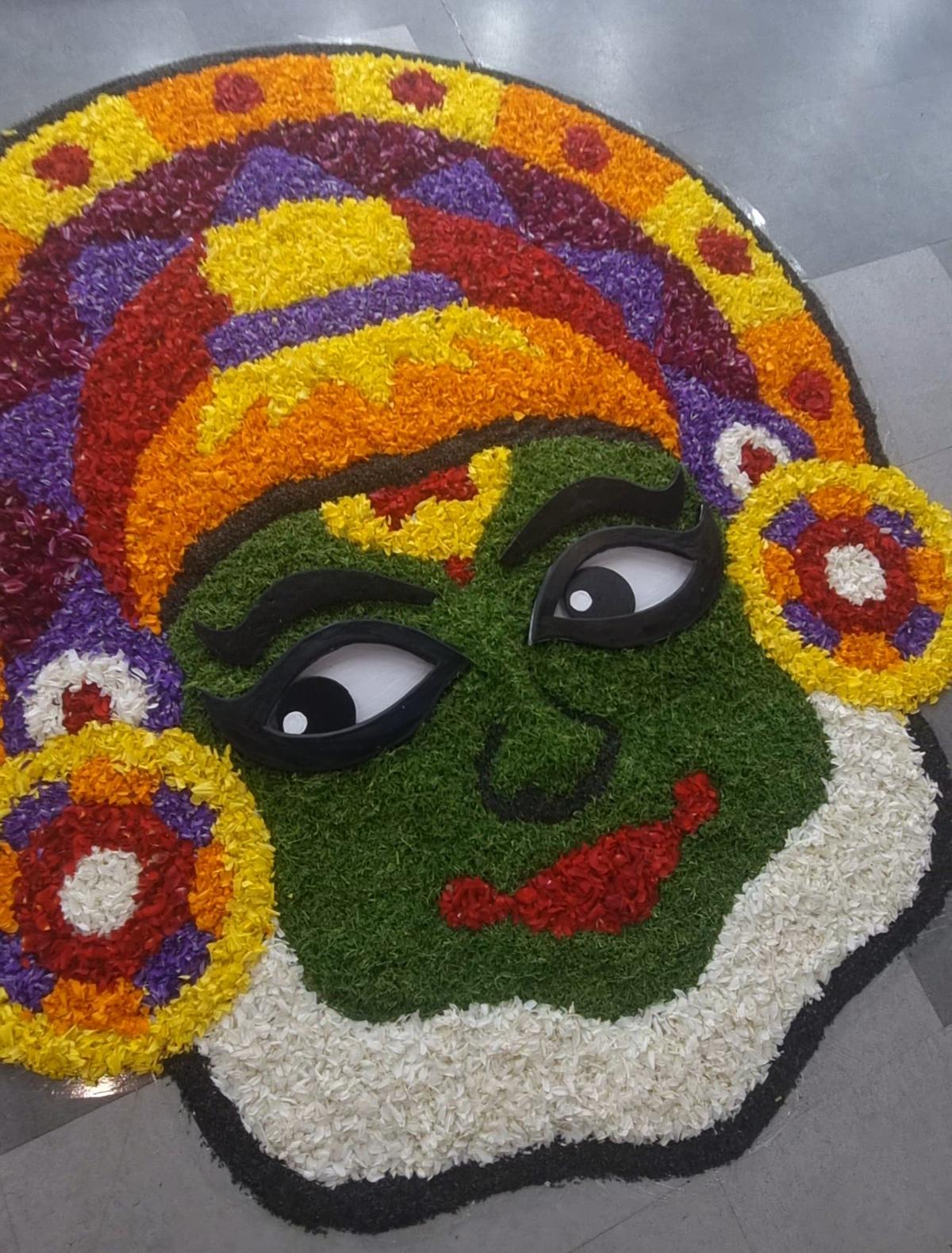 Pookkalam with Kathakali design