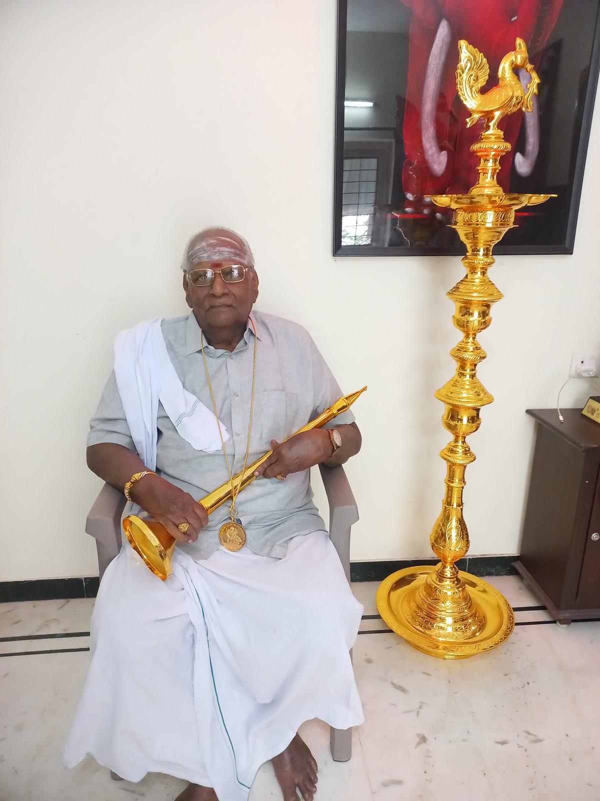 Rajanna with the gold-plated nagaswaram and kuthuvilakku
