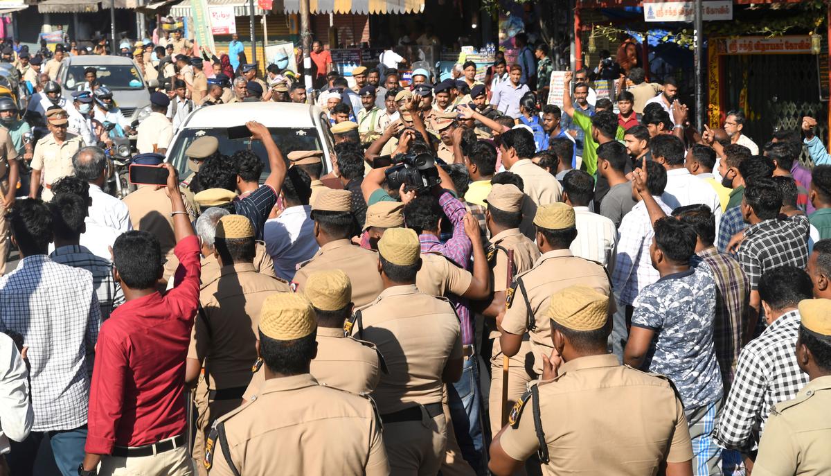 Members of Popular Front of India (PFI) shout slogans against the officials of National Investigation Agency (NIA) who conducted searches at the premises of Mohammed Sigam, an office-bearer of the PFI’s Madurai district unit, at Goripalayam in Madurai on September 22, 2022.