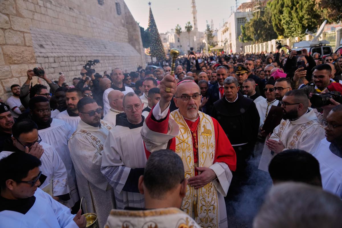Latin Patriarch Pierbattista Pizzaballa, the top Catholic clergyman in the Holy Land, arrives at the Church of the Nativity, traditionally believed to be the birthplace of Jesus, on Christmas Eve, in the West Bank city of Bethlehem, on Wednesday, Dec. 24, 2025. 