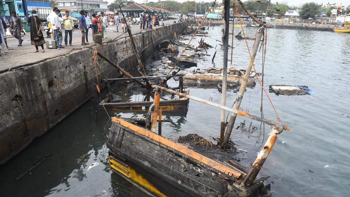 Salvaging boats that sank after Vizag fishing harbour fire is a Herculean task