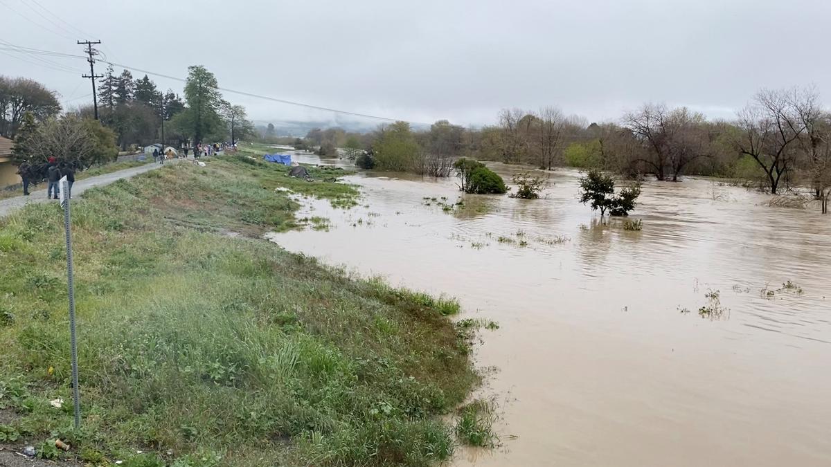 Storm breaches California river’s levee, thousands evacuate