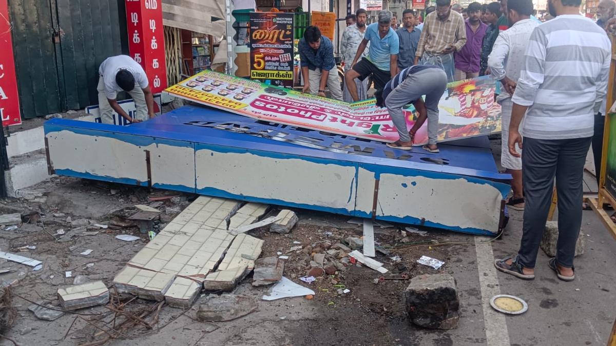 Two injured as signboard collapses from old building