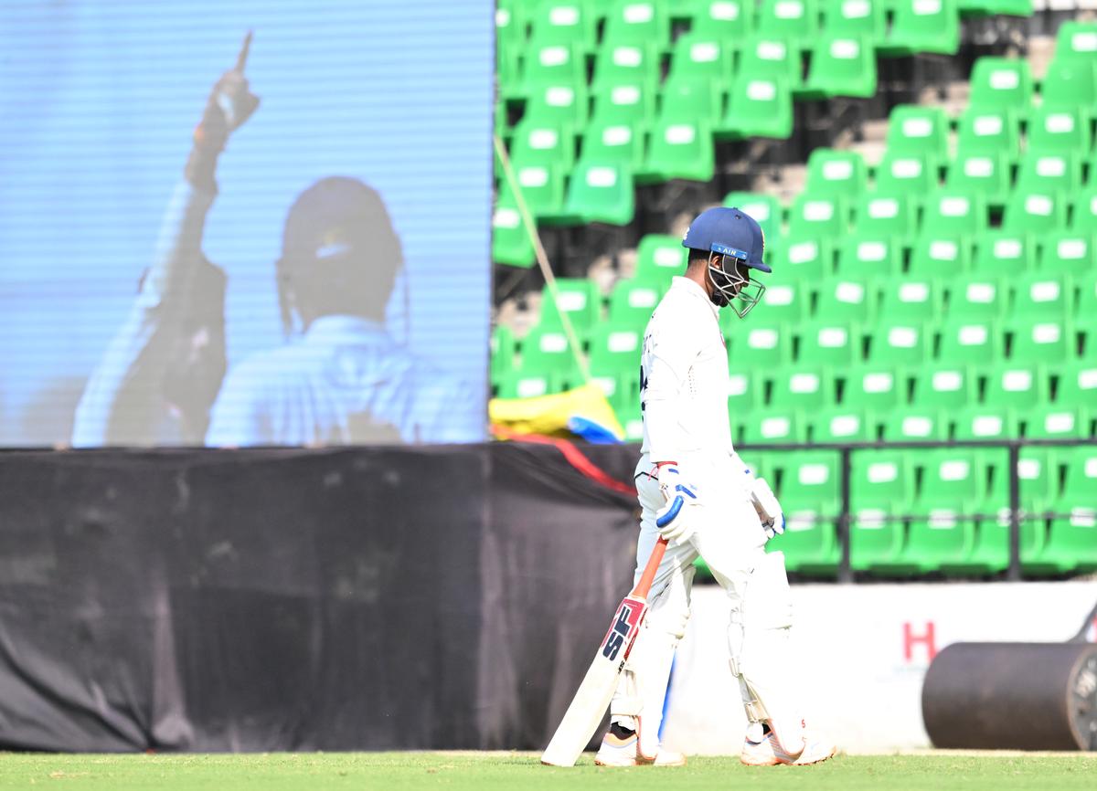 Kerala captain Baby walks back after getting out at 98 during Ranji Trophy Final between Kerala and Vidarbha.