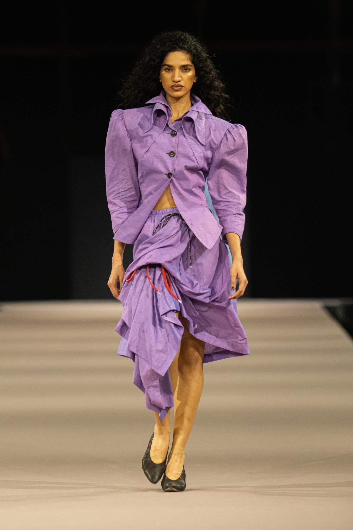 A model walks down the runway at the Vivienne Westwood show in Mumbai A model walks down the runway at the Vivienne Westwood show in Mumbai