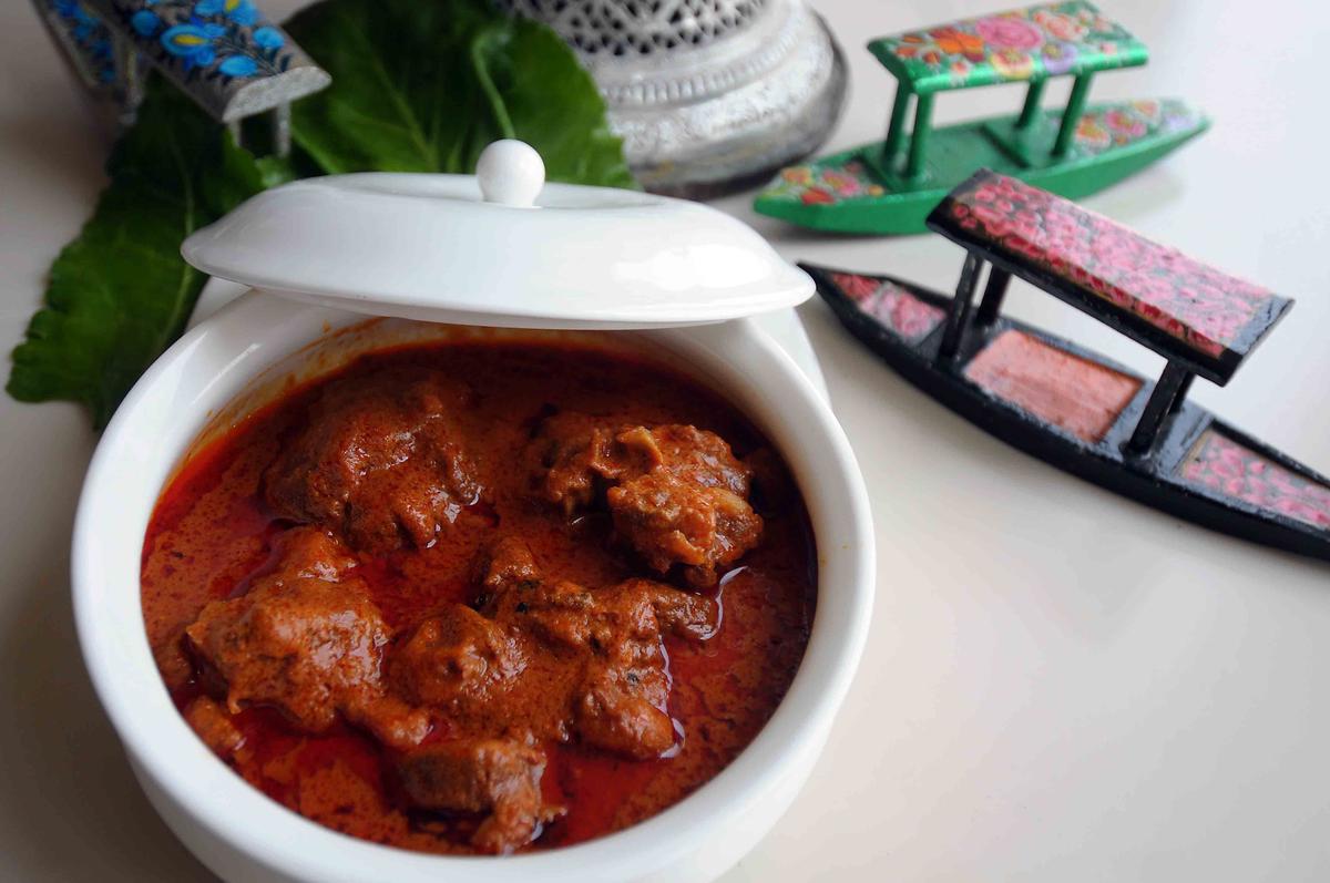 Rogan josh: select mutton pieces cooked in Kashmiri onion gravy with cockscomb flower water.