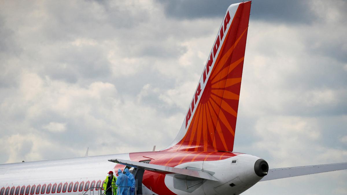 Air India plane makes emergency landing at Delhi airport after suspected engine fire