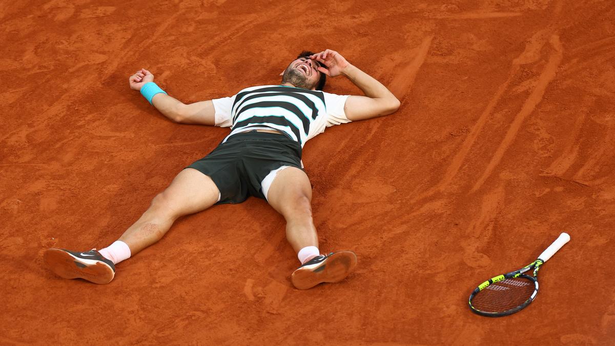 Alcaraz defends French Open title in five sets against Sinner in longest-ever final
