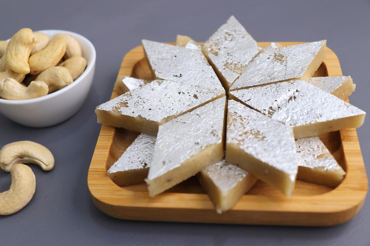 Kaju katli, marzipan-like but made with ground cashewnut and flavoured with rose water and saffron, and topped with silver leaf.