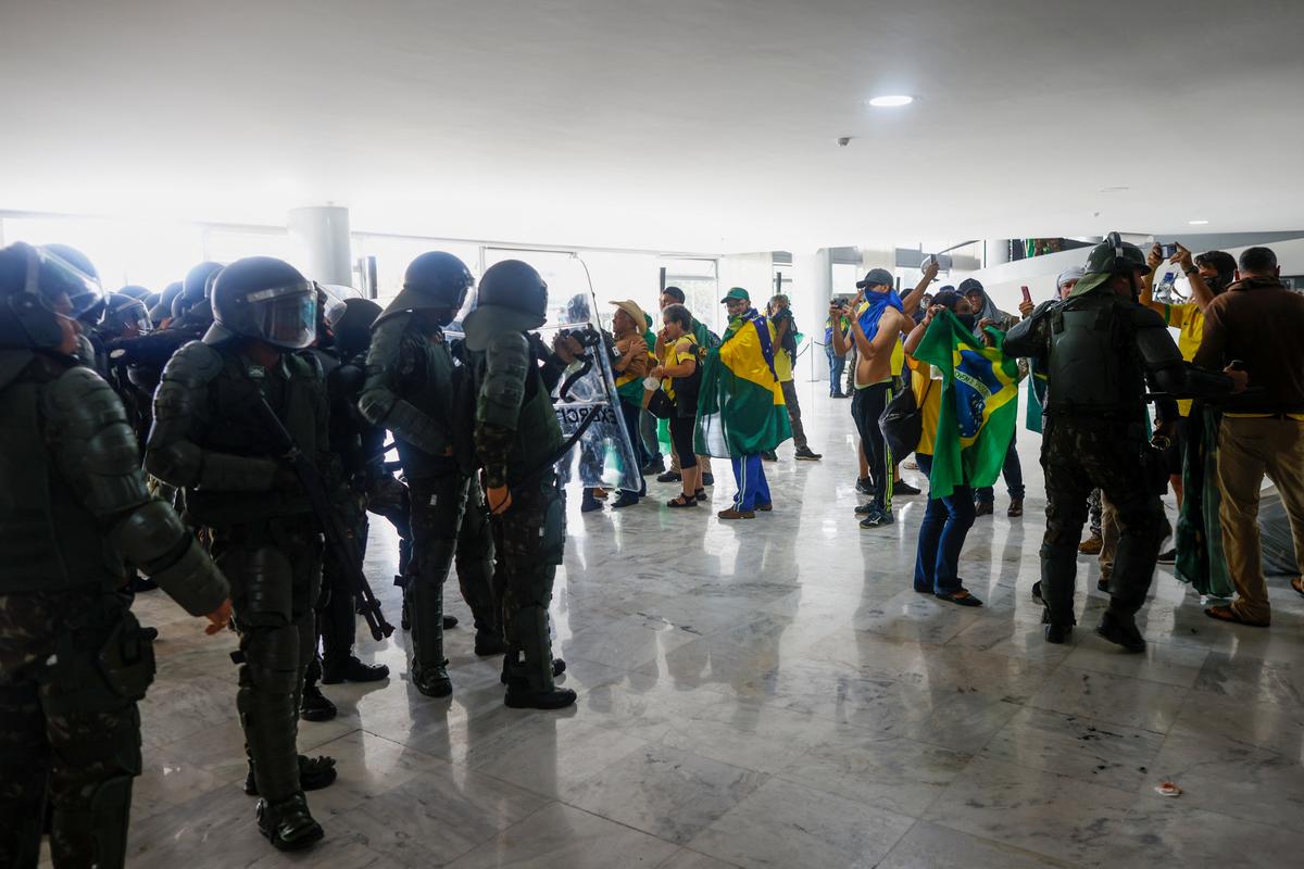 Security forces operate as supporters of Brazil’s former President Jair Bolsonaro demonstrate against President Luiz Inacio Lula da Silva, in Planalto Palace, in Brasilia, Brazil.